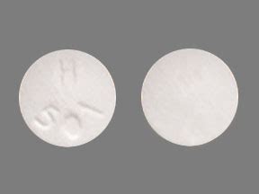 H 501 white round - Color: white Shape: round Imprint: WPI 3969. This medicine is a white, oblong, tablet imprinted with "K" and "11". metronidazole 500 mg tablet. Color: white Shape: oblong Imprint: 3970 WPI.